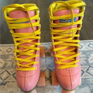 Impala Coral Pink Roller Skates with Bright Yellow Laces